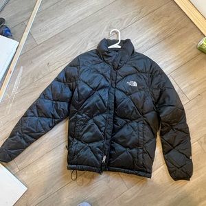 Women’s North Face down jacket. Size medium